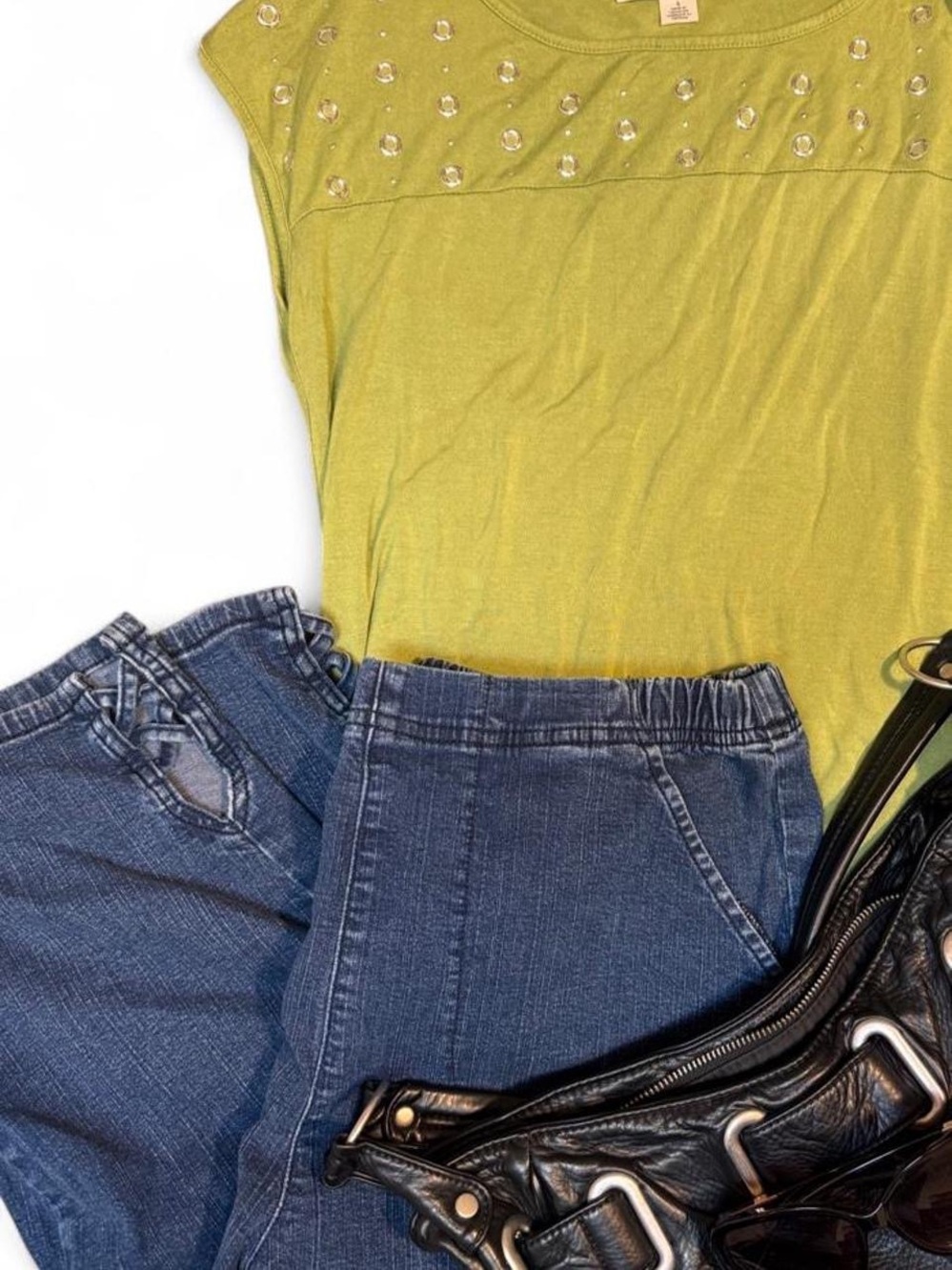 Vintage dark wash capris with cross design on the bottoms